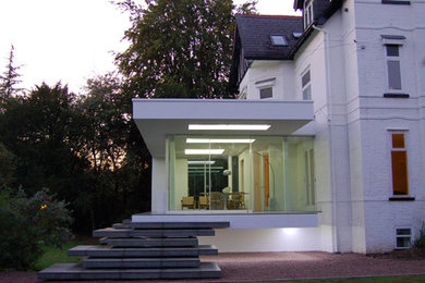 Inspiration for a white contemporary house exterior in Cheshire.