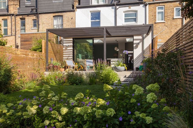 Contemporary House Exterior by Simon Orchard Garden Design
