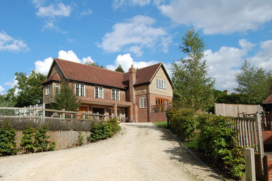 This is an example of a contemporary house exterior in Surrey.