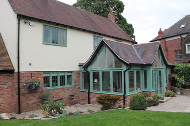 Traditional house exterior in Cheshire with mixed cladding and a pitched roof.