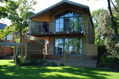 This is an example of a contemporary house exterior in Other.