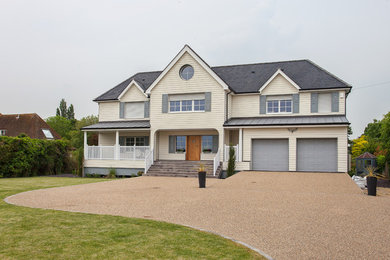 Design ideas for a large and beige modern detached house in Oxfordshire.