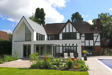 Photo of a traditional house exterior in Surrey.