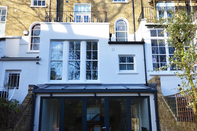 Inspiration for a large contemporary house exterior in London.