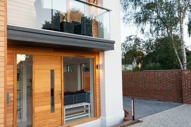 Design ideas for a contemporary house exterior in Sussex.