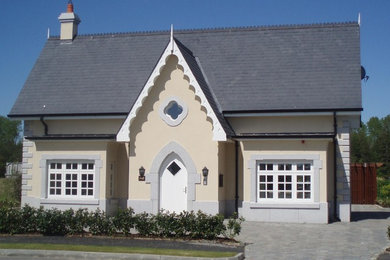 This is an example of a medium sized country house exterior in Dublin.