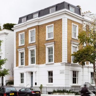 Großes, Vierstöckiges, Schwarzes Klassisches Reihenhaus mit Backsteinfassade, Mansardendach und Ziegeldach in London