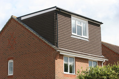 This is an example of a contemporary house exterior in Sussex.