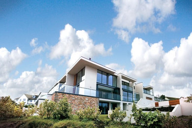 Photo of a contemporary house exterior in Devon.