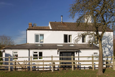 Photo of a farmhouse render detached house in London.