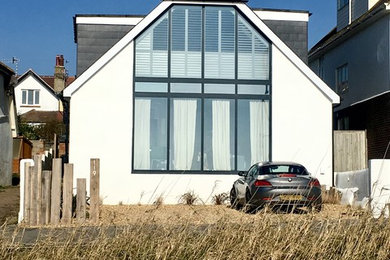 Photo of a beach style house exterior in Sussex.