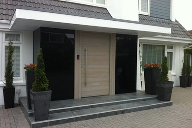 This is an example of a contemporary house exterior in Channel Islands.