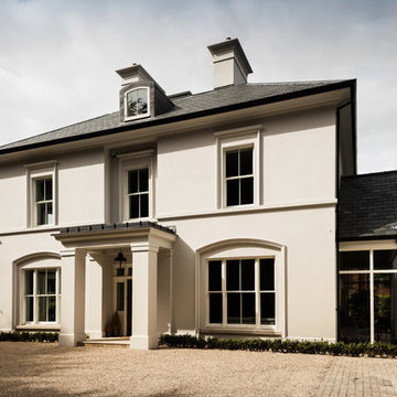 Modern yet classical villa with curved bay and elliptical staircase