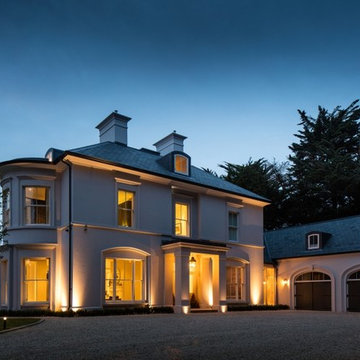 Modern yet classical villa with curved bay and elliptical staircase