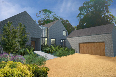 Inspiration for a large and gey contemporary two floor brick house exterior in London with a pitched roof.
