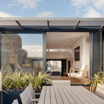 Narrow House roof terrace and split-level studio room