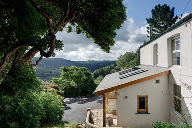 Design ideas for a small and white classic bungalow glass detached house in Cornwall with a lean-to roof and a tiled roof.