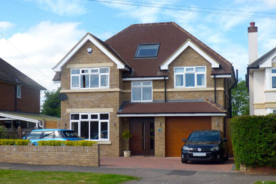 Design ideas for a large contemporary house exterior in Hertfordshire.