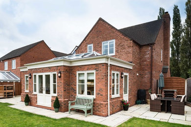 This is an example of a medium sized farmhouse house exterior in West Midlands.