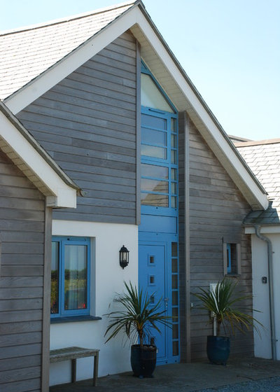 Beach Style Exterior by The Bazeley Partnership