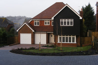 Photo of a medium sized traditional house exterior in Kent.