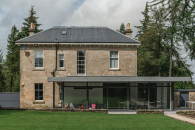 Design ideas for a contemporary house exterior in Glasgow.