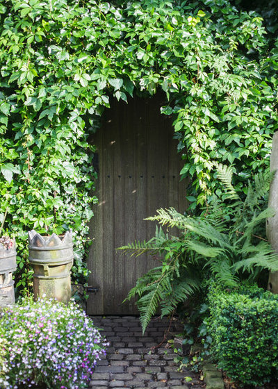 Traditional House Exterior by Barnes Walker Ltd - Landscape Architects