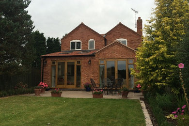 Design ideas for a modern house exterior in West Midlands.