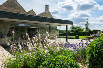 This is an example of a contemporary house exterior in Gloucestershire.