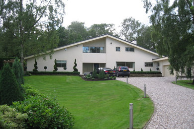 This is an example of a contemporary house exterior in Gloucestershire.