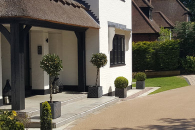 This is an example of a medium sized traditional house exterior in London.