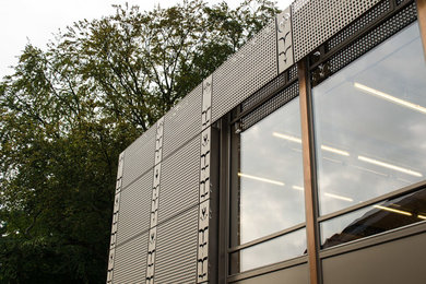 Contemporary house exterior in Oxfordshire with metal cladding.