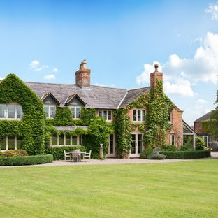 Inspiration for an expansive farmhouse two floor brick detached house in Cheshire with a hip roof.