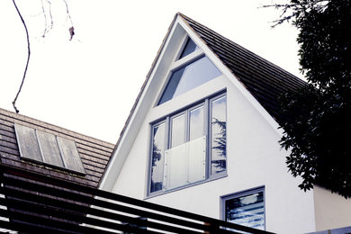 Inspiration for a traditional house exterior in Surrey.