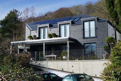 Design ideas for a modern house exterior in Dorset.