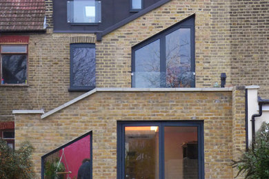 Design ideas for a contemporary terraced house in London with three floors.