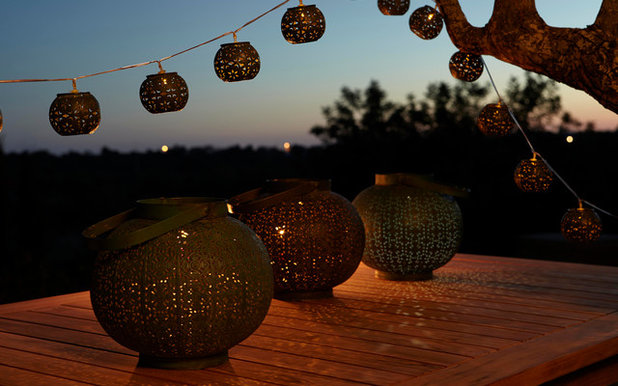 Contemporary House Exterior String Lights and Lanterns