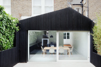 Design ideas for a small contemporary house exterior in London.