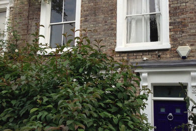 ロンドンにあるエクレクティックスタイルのおしゃれな家の外観の写真