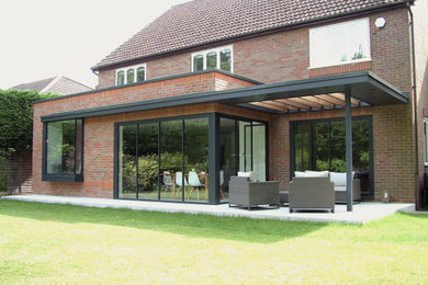 Photo of a contemporary house exterior in Hertfordshire.