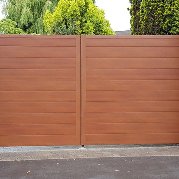 VulcaLap® aluminium gate in 'Teak' wood finish