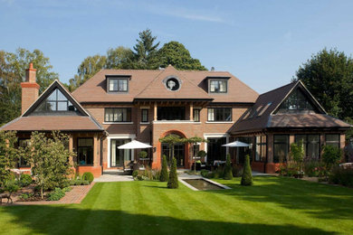 Inspiration for a contemporary house exterior in Surrey.