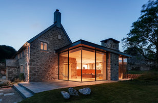 Design ideas for a rural house exterior in Devon with stone cladding.