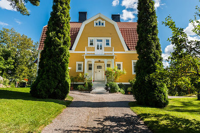 Inspiration pour une façade de maison traditionnelle.