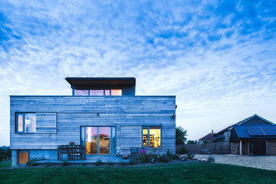 Design ideas for a contemporary house exterior in Cambridgeshire.