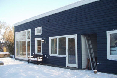 Design ideas for a scandinavian house exterior in Aarhus.