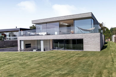 Example of a large minimalist exterior home design in Aarhus