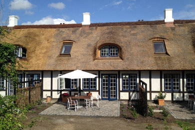 This is an example of a farmhouse house exterior in Aarhus.