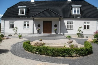 Design ideas for a scandinavian house exterior in Odense.