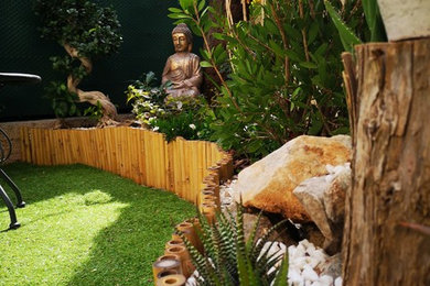 Inspiration pour un jardin asiatique de taille moyenne et au printemps avec une exposition partiellement ombragée.